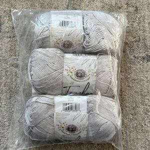 Lion Brand Truboo
Color: silver
Size 241yds each
3Pkg
